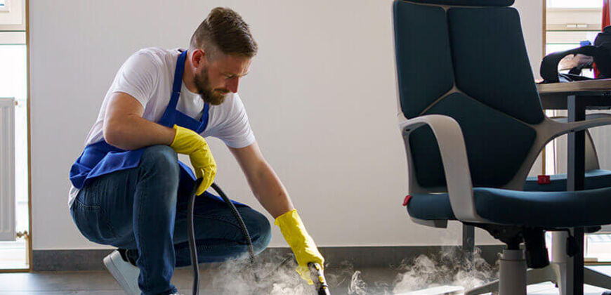 Commercial cleaning technician working in an office space